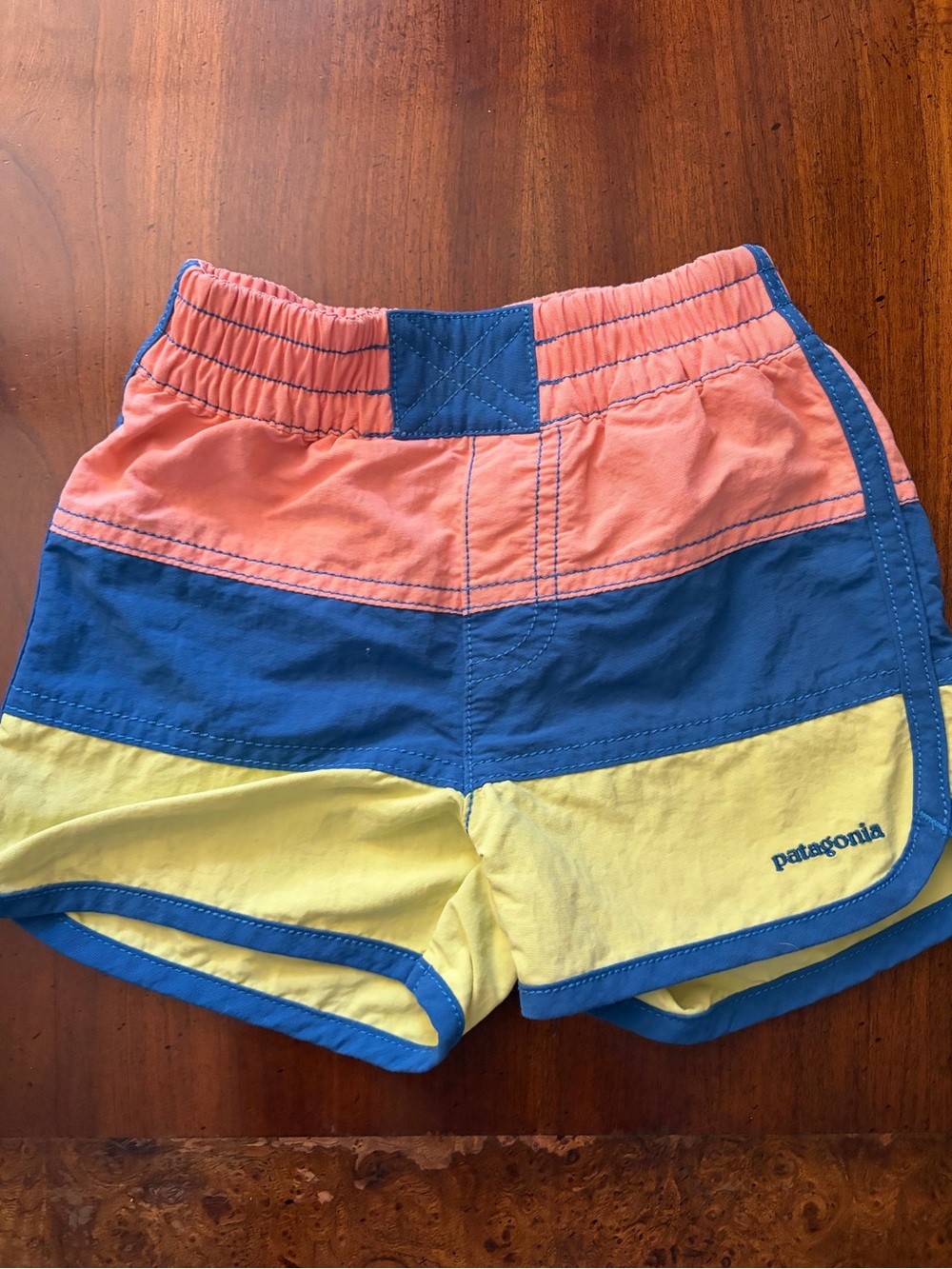 Patagonia Kids Colorblock Swim Shorts in Coral, Blue & Yellow